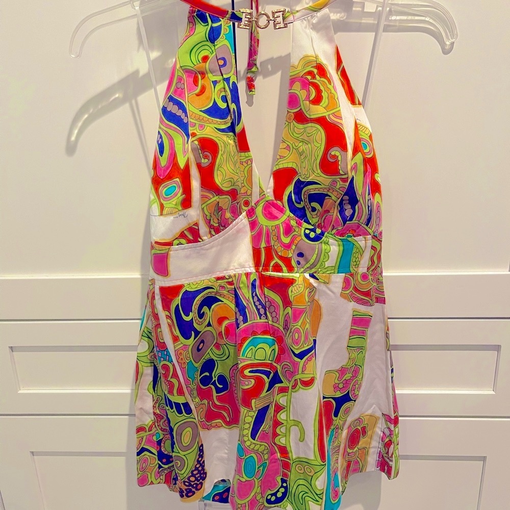 TRINA TURK halter with gold detailing. Ties at neck size 6